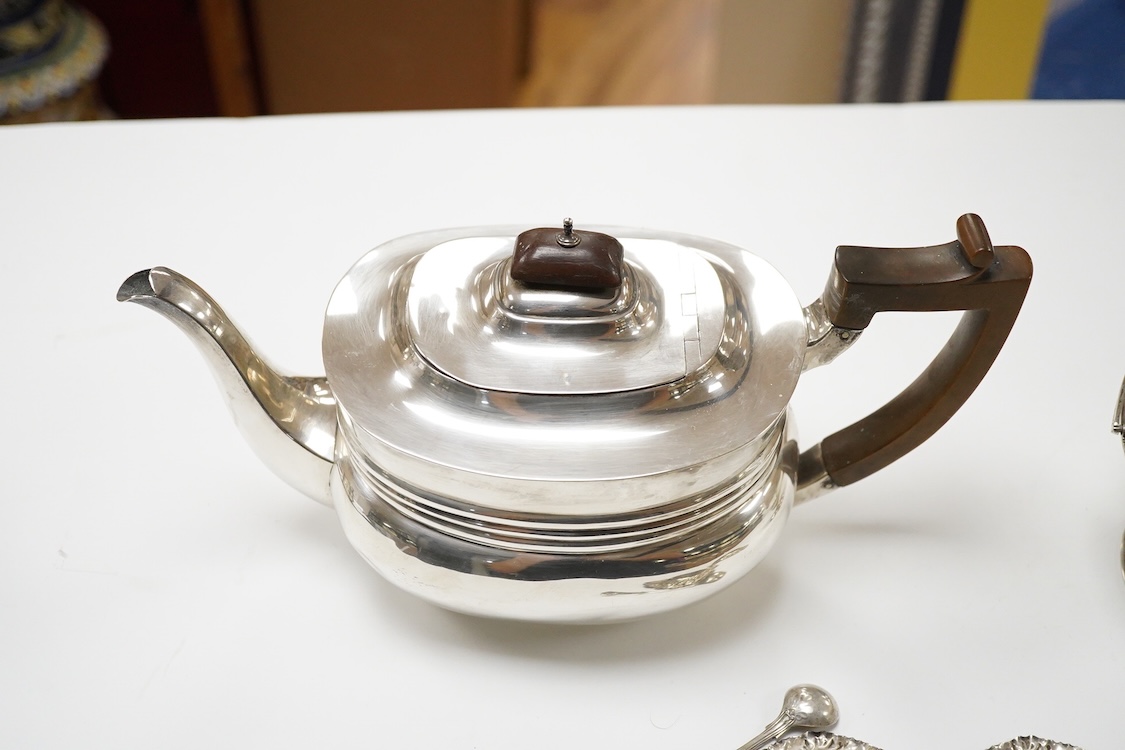 A late Victorian silver boat shaped sugar basket, by Thomas Bradbury & Sons, London, 1896, length 13.2cm, together with a pair of late Victorian repousse silver nut dishes and a silver condiment spoon. 4.8oz.